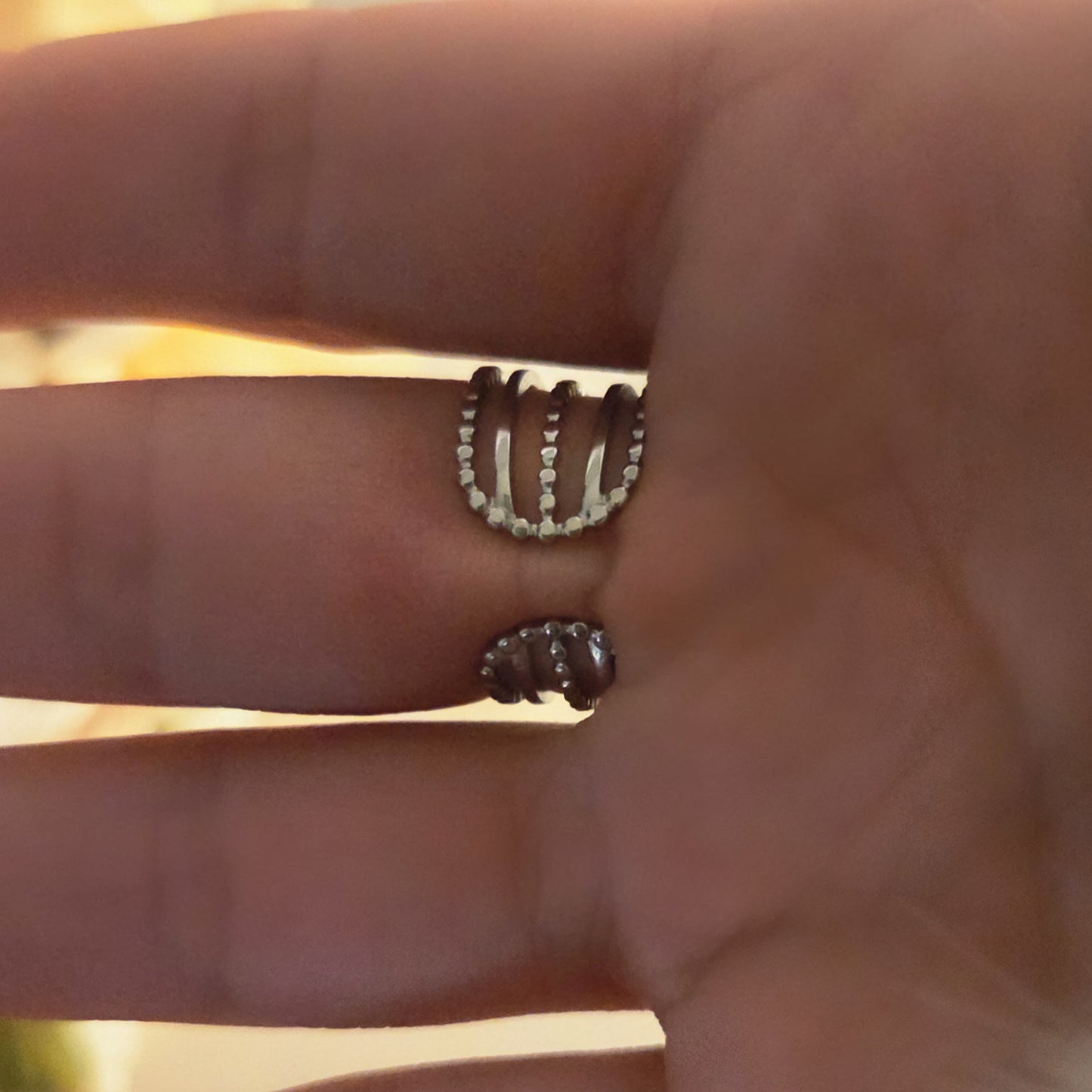 Bague argentée acier inoxydable – multi-anneaux pendentif rond