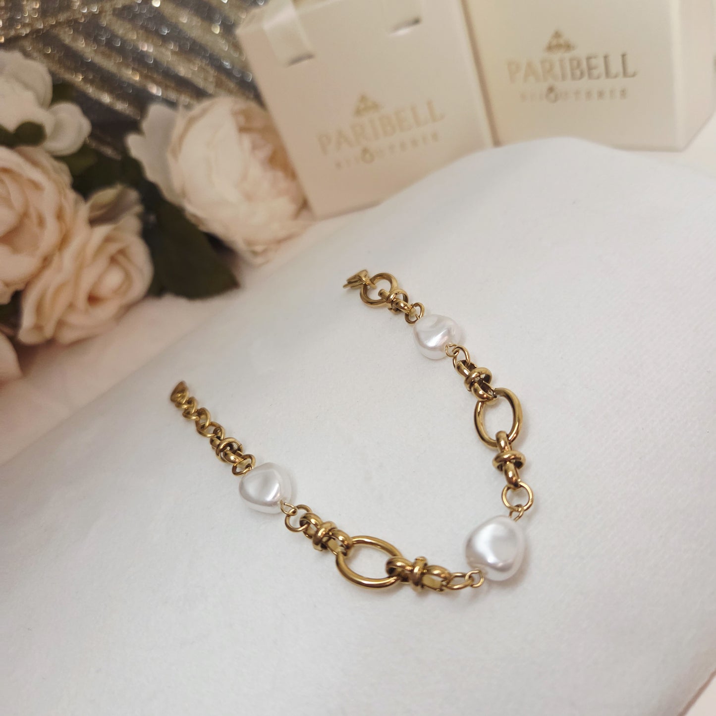 Bracelet maillons dorés et perles élégantes