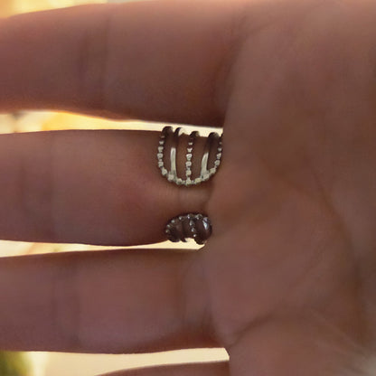 Bague argentée acier inoxydable – multi-anneaux pendentif rond