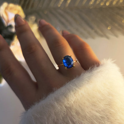 Bague dorée acier inoxydable – pierre bleue ovale ajustable