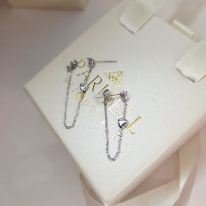 Paire de boucles d’oreilles pendantes avec strass et chaîne fine