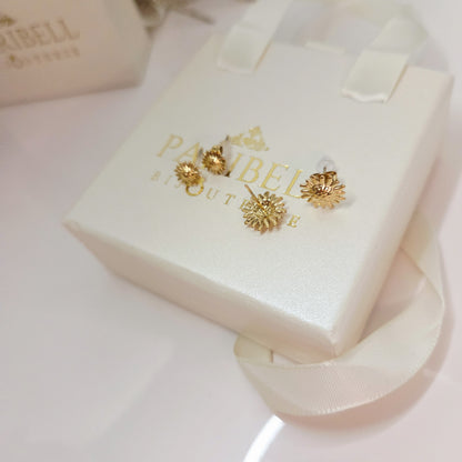 Paire de boucles d’oreilles puces motif soleil