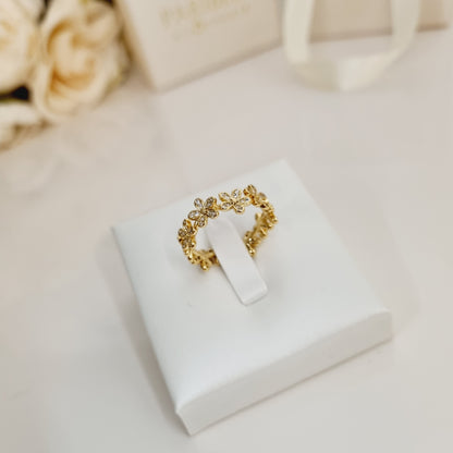 Bague Eryanne en forme de fleurs dorées avec zirconium