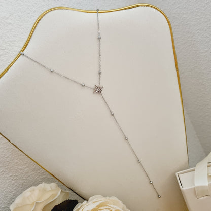 Bijou raffiné avec perles nacrées et pendentif étoile