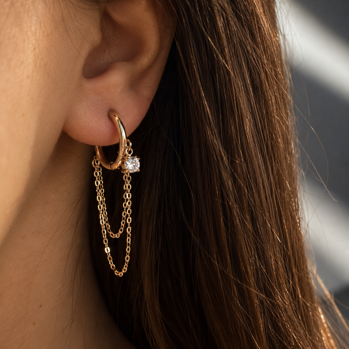 Boucles d'oreilles créoles dorées à chaînes pendantes et zircon