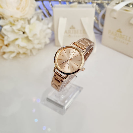 Montre rose gold en acier inoxydable pour femme, modèle Seraly, design raffiné et moderne.