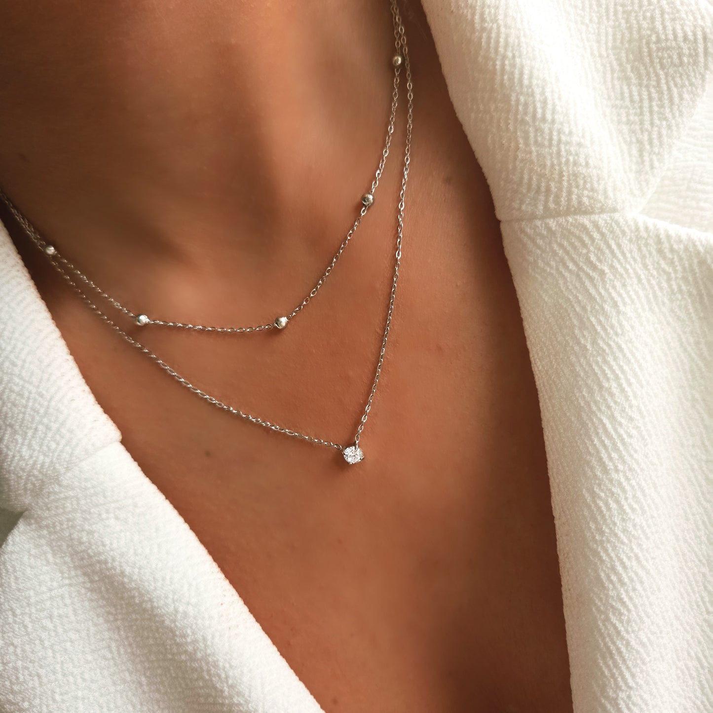 Collier double rang – Chaîne fine et pendentif zircon en acier inoxydable