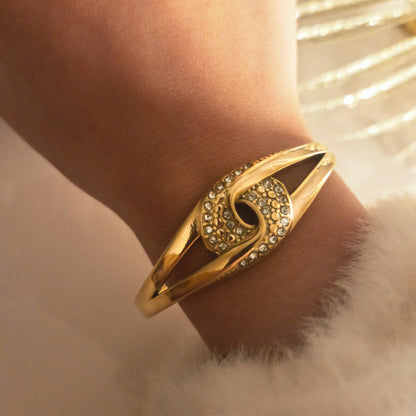 Bracelet jonc doré motif œil avec zircons