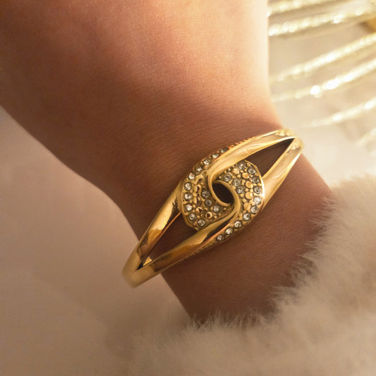 Bracelet jonc doré motif œil avec zircons