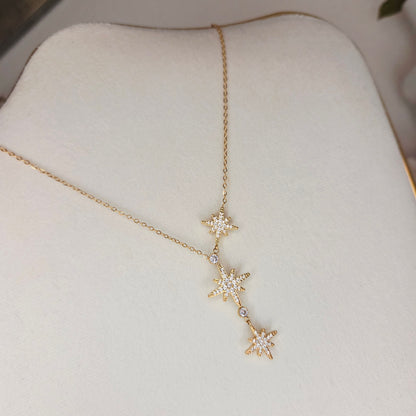 Collier doré triple étoile – autre vue