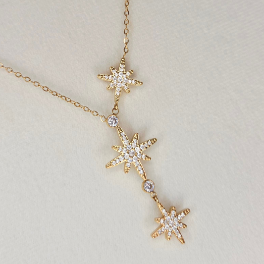Collier doré triple étoile