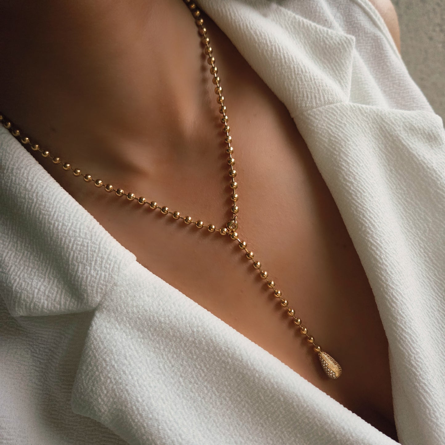 Collier Y en acier inoxydable doré